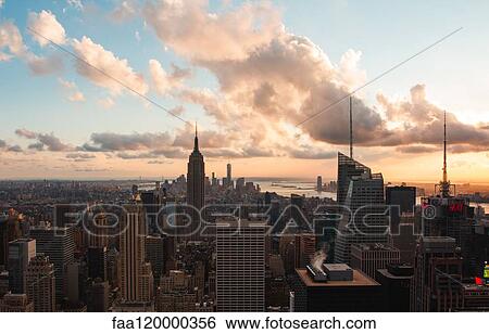 View of Empire State building with modern cityscape View Large Photo Image Stock Photograph - View of Empire State building with modern cityscape. Fotosearch