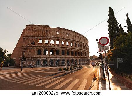 View of historic Colosseum at sunset View Large Photo Image Stock Photography - View of historic Colosseum at sunset. Fotosearch