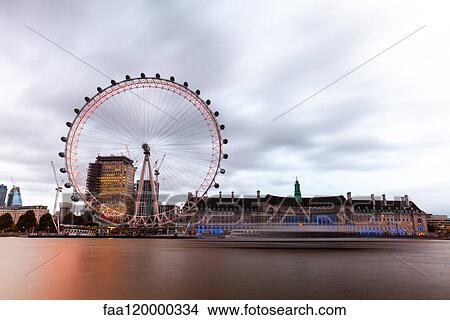 View of Millennium Wheel with cityscape at dusk View Large Photo Image Picture - View of Millennium Wheel with cityscape at dusk. Fotosearch