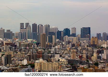 View of modern skyscrapers in Shinjuku View Large Photo Image Picture - View of modern skyscrapers in Shinjuku. Fotosearch