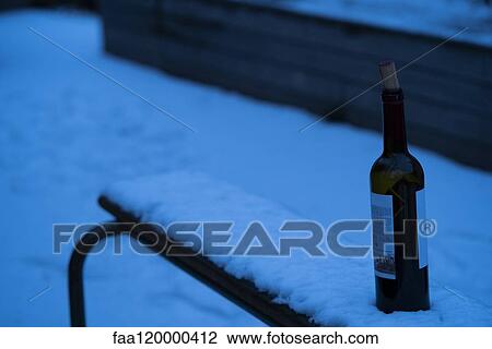 Wine bottle in snow View Large Photo Image Stock Image - Wine bottle in snow. Fotosearch