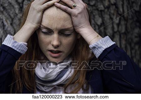 Woman having headache View Large Photo Image Stock Image - Woman having headache. Fotosearch