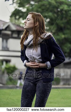 Woman having stomach pain View Large Photo Image Stock Photo - Woman having stomach pain. Fotosearch
