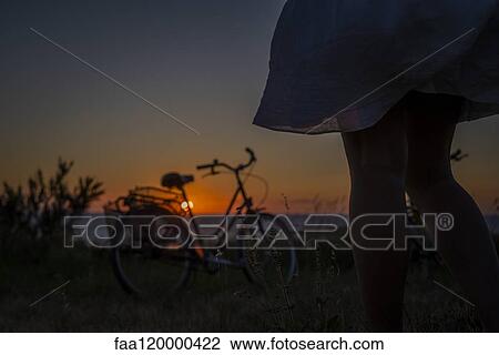 Woman standing on landscape View Large Photo Image Stock Image - Woman standing on landscape. Fotosearch