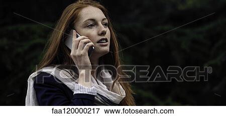 Woman talking on smart phone View Large Photo Image Stock Photo - Woman talking on smart phone. Fotosearch