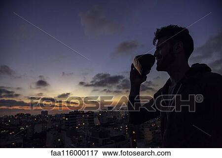 Stock Photo - Young man with virtual reality headset. Fotosearch
