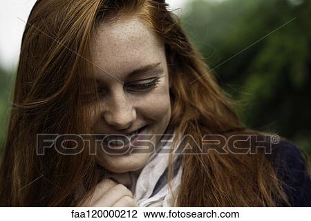 Young woman smiling View Large Photo Image Stock Image - Young woman smiling. Fotosearch