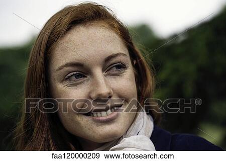 Young woman smiling View Large Photo Image Stock Photo - Young woman smiling. Fotosearch