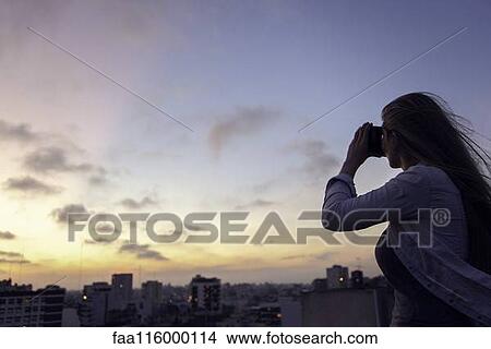 Young woman with virtual reality headset View Large Photo Image Picture - Young woman with virtual reality headset. Fotosearch