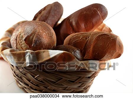 Basket full of bread, close-up View Large Photo Image Picture - Basket full of bread, close-up. Fotosearch