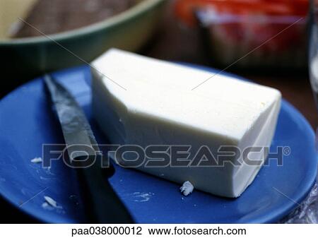 Butter on plate with knife View Large Photo Image Stock Image - Butter on plate with knife. Fotosearch