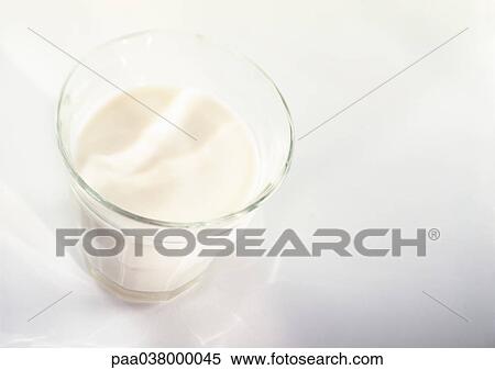 Glass of milk, elevated view View Large Photo Image Stock Photography - Glass of milk, elevated view. Fotosearch