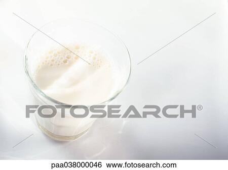 Half-full glass, elevated view View Large Photo Image Stock Photograph - Half-full glass, elevated view. Fotosearch