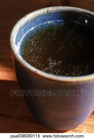Stock Photography - Mug of apple cider, close-up. Fotosearch