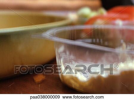 Plastic container with food inside, close-up, blurred View Large Photo Image Stock Photo - Plastic container with food inside, close-up, blurred. Fotosearch