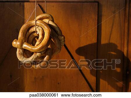 Pretzels hanging, close-up View Large Photo Image Stock Image - Pretzels hanging, close-up. Fotosearch
