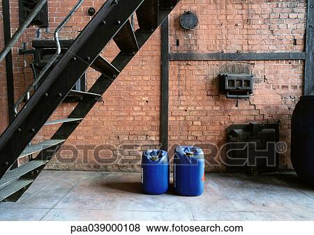 Cans under stairs View Large Photo Image Stock Photo - Cans under stairs. Fotosearch