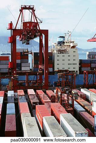 Cranes and containers in port View Large Photo Image Stock Image - Cranes and containers in port. Fotosearch
