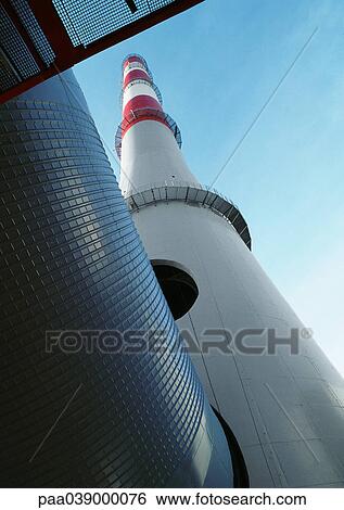 Industrial chimney, low angle view View Large Photo Image Stock Photograph - Industrial chimney, low angle view. Fotosearch