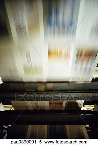 Printed paper on printing press, blurred motion View Large Photo Image Stock Photography - Printed paper on printing press, blurred motion. Fotosearch