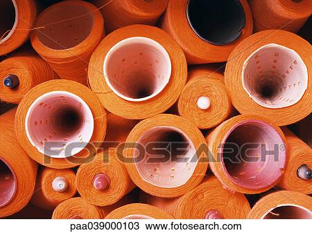 Stock Image - Spools of thread, close-up. Fotosearch