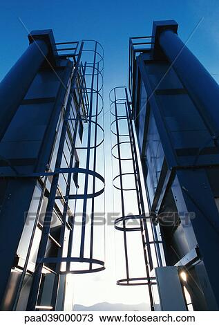 Two ladders in thermal power plant, low angle view View Large Photo Image Stock Image - Two ladders in thermal power plant, low angle view. Fotosearch
