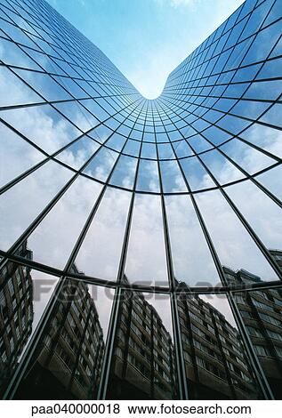Building reflected in skyscraper's facade, low angle view View Large Photo Image Stock Photo - Building reflected in skyscraper's facade, low angle view. Fotosearch