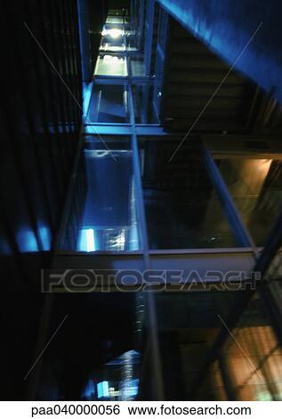 Interior of modern building, low angle view View Large Photo Image Stock Photograph - Interior of modern building, low angle view. Fotosearch
