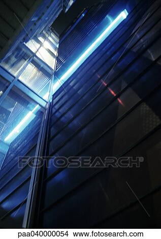 Neon lights in modern building, low angle view View Large Photo Image Picture - Neon lights in modern building, low angle view. Fotosearch