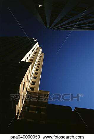 Skyscraper, low angle view View Large Photo Image Stock Photo - Skyscraper, low angle view. Fotosearch