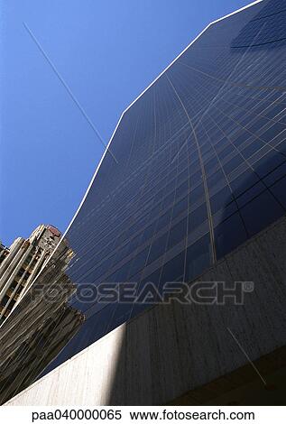 Skyscraper's facade, low angle view View Large Photo Image Stock Photography - Skyscraper's facade, low angle view. Fotosearch