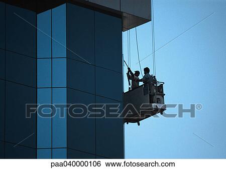 Two men cleaning skyscraper's windows View Large Photo Image Stock Photograph - Two men cleaning skyscraper's windows. Fotosearch
