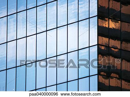 Stock Photograph - Window panes on building's facade, close-up. Fotosearch