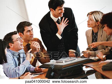 Business people in conference room View Large Photo Image Stock Image - Business people in conference room. Fotosearch
