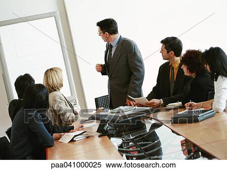 Business people in conference room View Large Photo Image Stock Photography - Business people in conference room. Fotosearch