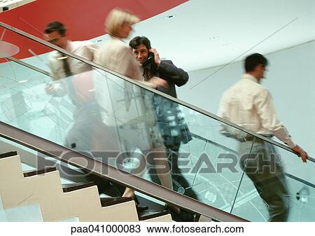 Business people on stairs, blurred View Large Photo Image Stock Image - Business people on stairs, blurred. Fotosearch
