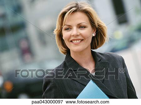 Businesswoman smiling, portrait View Large Photo Image Stock Photo - Businesswoman smiling, portrait. Fotosearch