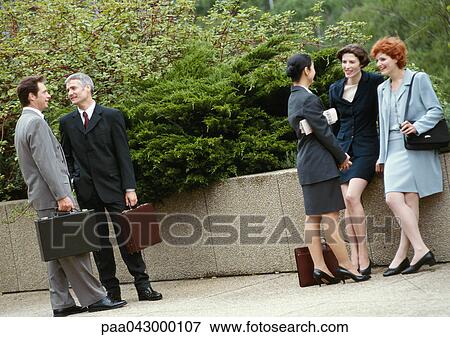 Group of business people standing outside View Large Photo Image Stock Photo - Group of business people standing outside. Fotosearch