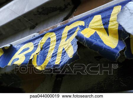 Stock Photo - Born text on torn poster. Fotosearch