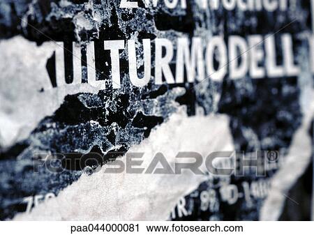 Cultural model text in German printed on torn poster, close-up View Large Photo Image Stock Image - Cultural model text in German printed on torn poster, close-up. Fotosearch