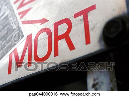 Death text in French on warning sign, close-up View Large Photo Image Stock Photograph - Death text in French on warning sign, close-up. Fotosearch