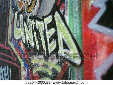 Stock Photo - Graffiti with word "united", close-up. Fotosearch