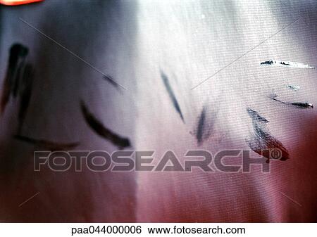 Stock Photograph -  "Love" text drawn on piece of fabric. Fotosearch