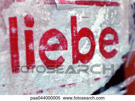 Stock Photography - Love text in German, close-up. Fotosearch