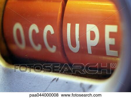 Occupied text in French, close-up View Large Photo Image Stock Photo - Occupied text in French, close-up. Fotosearch