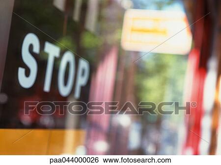 Stock Photograph - Stop text on sign, close-up. Fotosearch