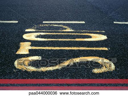 Stop text painted on asphalt, close-up View Large Photo Image Stock Photograph - Stop text painted on asphalt, close-up. Fotosearch