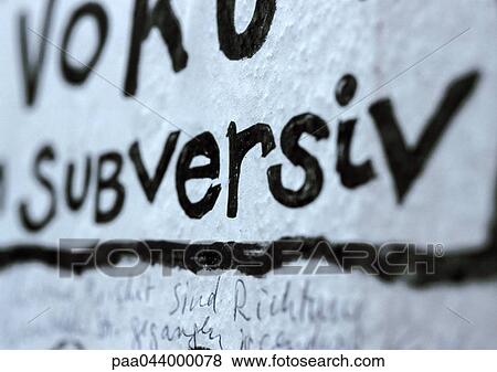 Stock Photo - Subversive text in german, close-up. Fotosearch