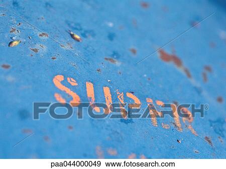 Super text stenciled on rusty surface, close-up View Large Photo Image Stock Photo - Super text stenciled on rusty surface, close-up. Fotosearch