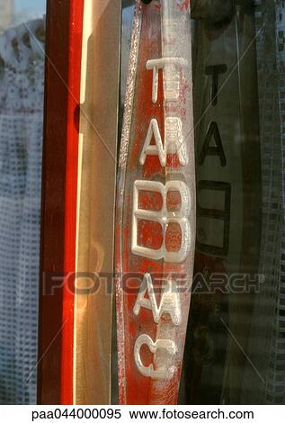 Tobacco text in French on sign, blurred View Large Photo Image Stock Photography - Tobacco text in French on sign, blurred. Fotosearch